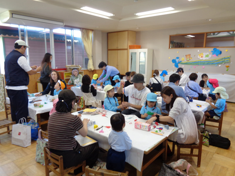 「ここ押さえていてね」「このタイヤまわらないよ」「じゃあ、もう一回」